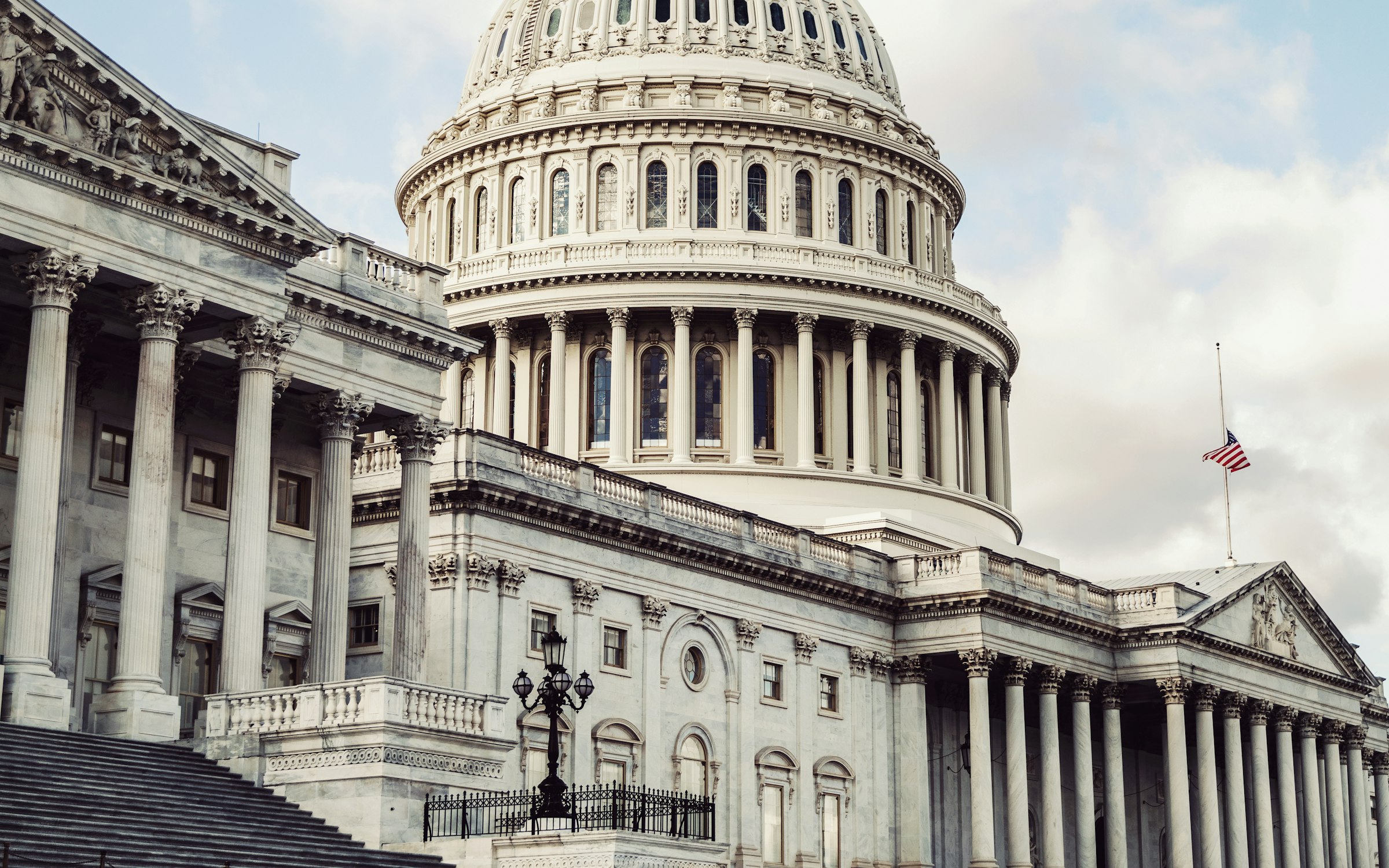Neoclassical capitol dome and colonnade in pale stone